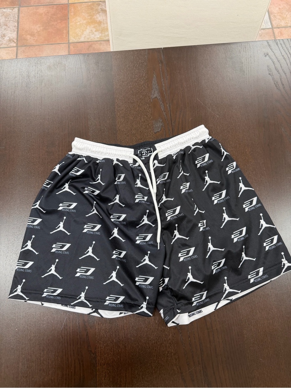 One pair of size small reversible basketball shorts